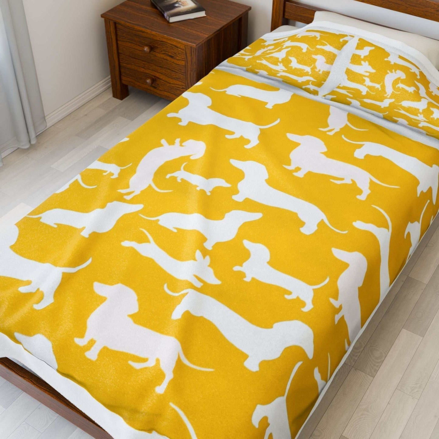 Velveteen plush blanket with dog pattern in vibrant yellow tones, perfect for dog lovers.