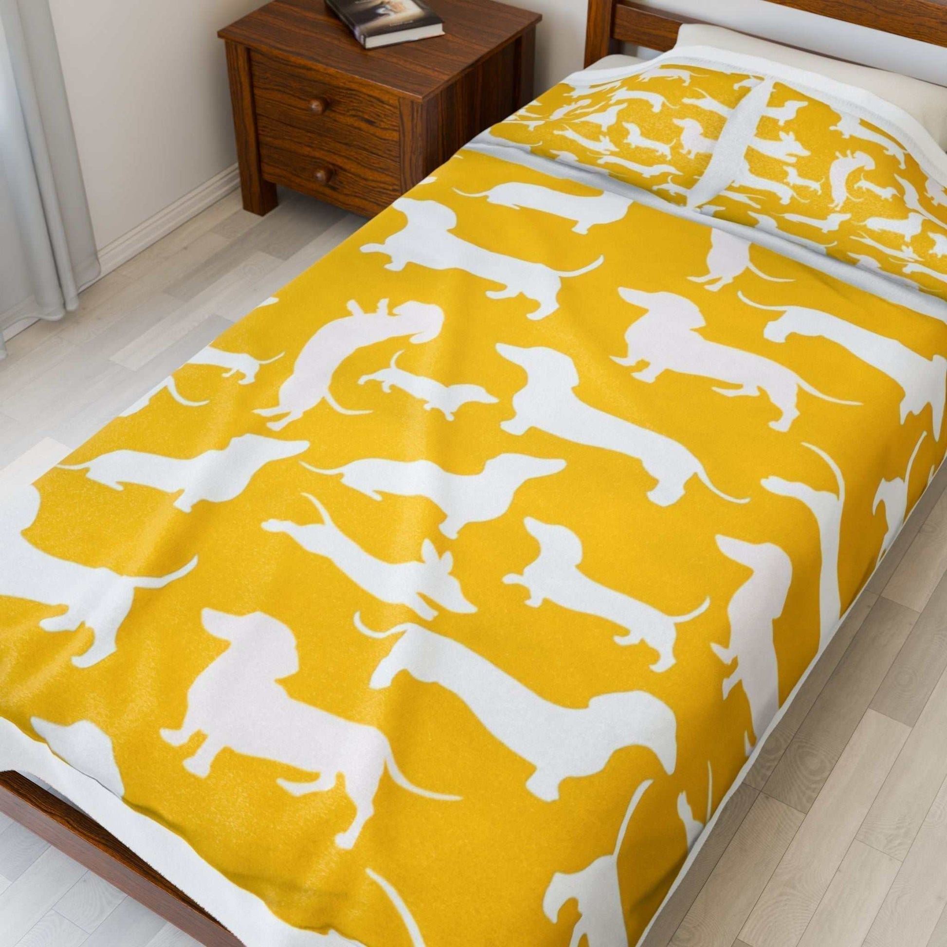 Velveteen plush blanket with dog pattern in vibrant yellow tones, perfect for dog lovers.
