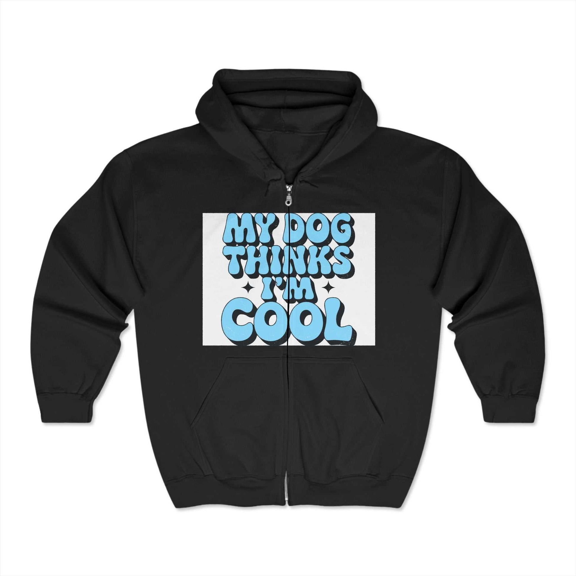 Unisex Heavy Blend™ Full Zip Hooded Sweatshirt in black with "My Dog Thinks I'm Cool" graphic.