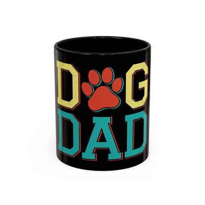 Dog Dad accent coffee mug 11oz black ceramic with colorful text and paw print design.