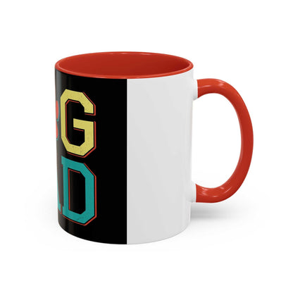 Ceramic coffee mug with colorful "DOG DAD" design, red interior and handle, 11oz size.