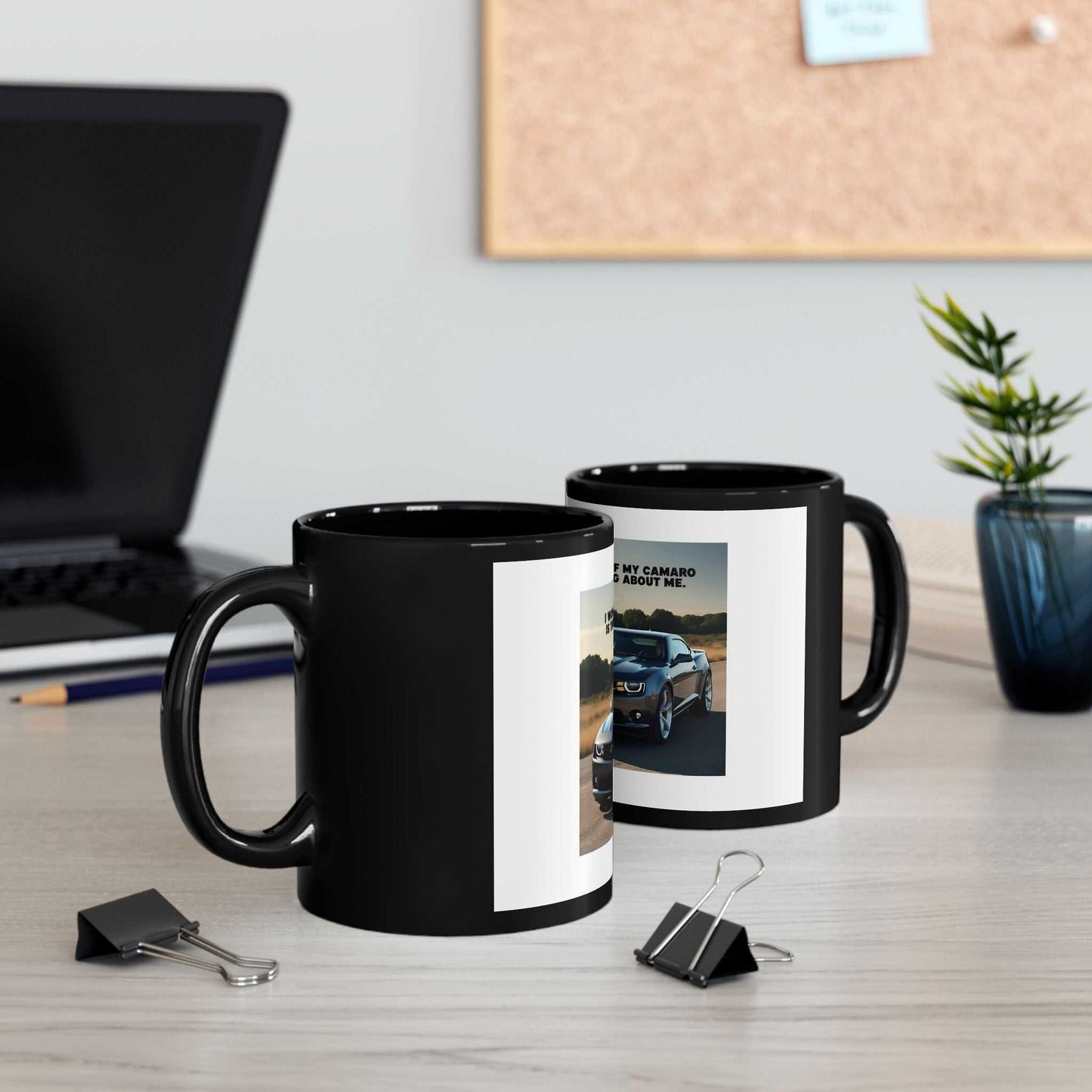 Camaro Lover's Black Mug on desk, featuring sleek ceramic design with printed Camaro graphic.