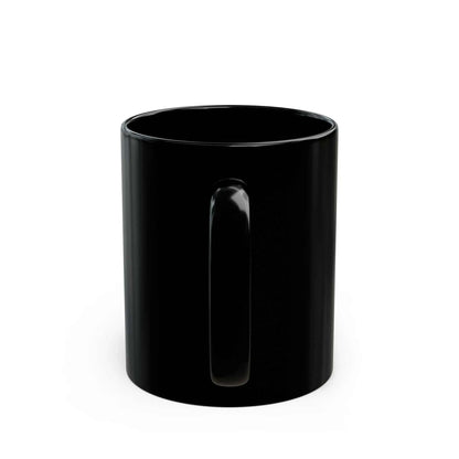 Black ceramic mug with "Don't Like Dogs" statement, sleek finish, humor-themed design.