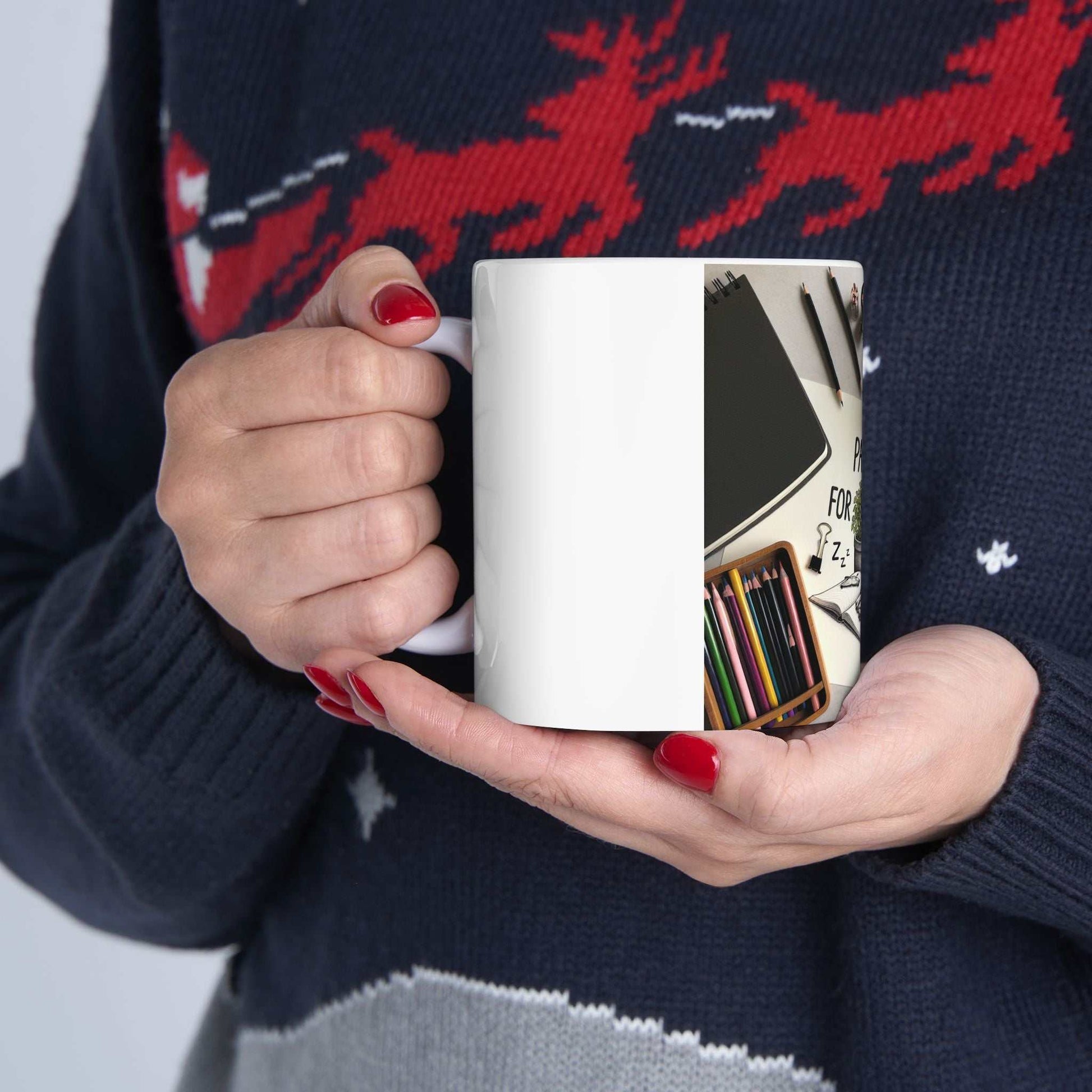 Paw-some Nap Ceramic Mug being held by person wearing a festive sweater.