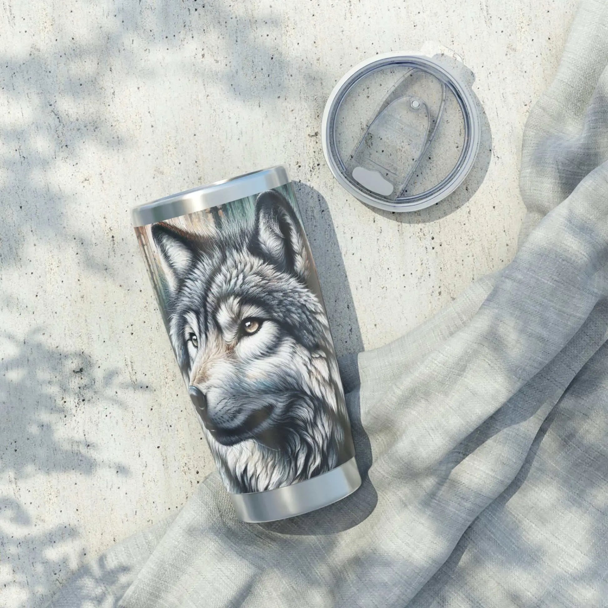 Vagabond Wolf 20oz Tumbler with vibrant wolf design, insulated mug for adventurers.