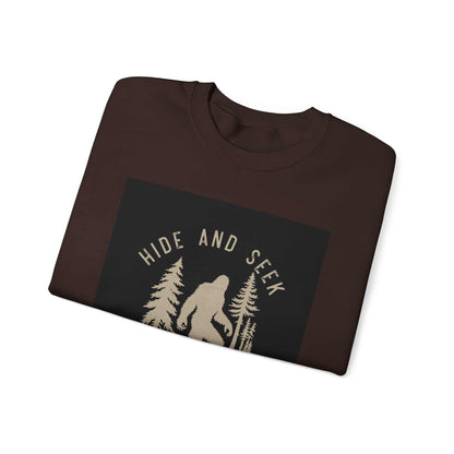 Unisex Heavy Blend™ Crewneck Sweatshirt with "Hide and Seek" graphic, folded view.