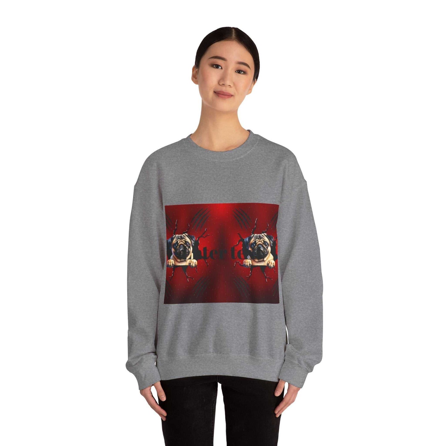 Pug dog sweatshirt with playful design on grey fabric, worn by a person.