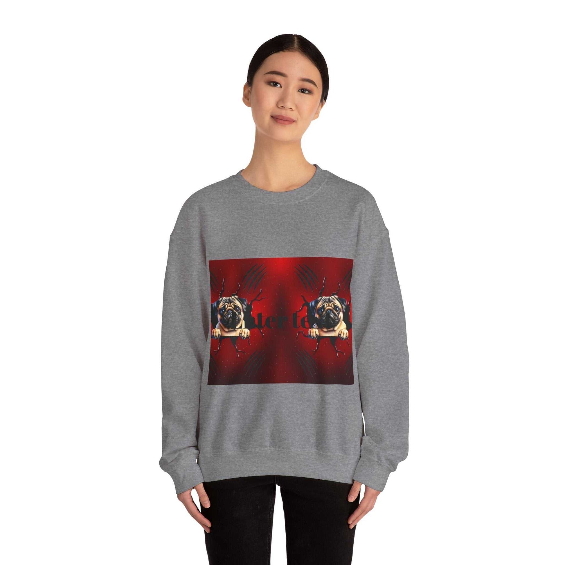 Pug dog sweatshirt with playful design on grey fabric, worn by a person.