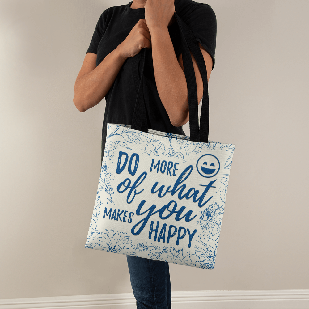 Classic tote bag with motivational design held by person.