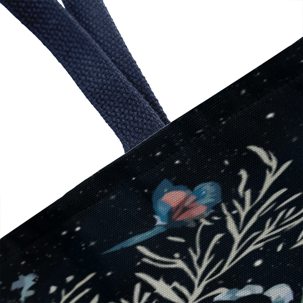Classic tote bag with floral design, navy blue straps, and white accents.